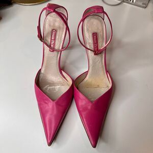 Cesare Paciotti daggers distinctive ring detail on the heel leather sling back